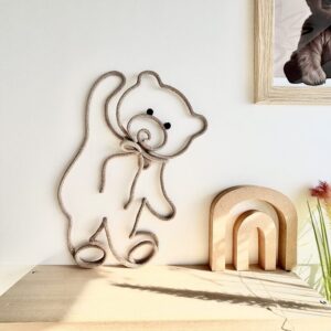 teddy bear wall decor made of rope and wire in neutral nursery