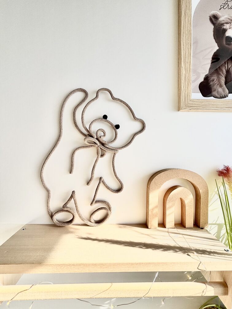 teddy bear wall decor made of rope and wire in neutral nursery