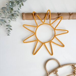 sun wall decor made of cotton rope and wire for boho nursery