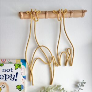 safari nursery giraffe wall hanging in neutral tones