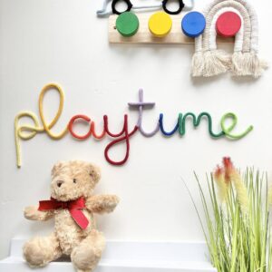 multicolour playtime wall sign in rainbow letters for kids room