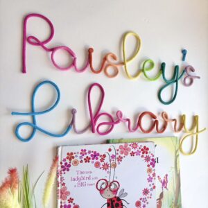 Library personalized wall sign with rainbow colored letters playful decor for kids book nook or reading space