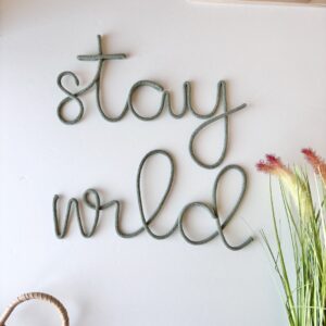 Stay Wild wall sign for kids room decor above playroom wall