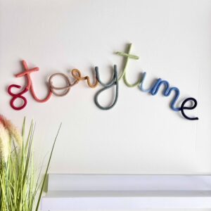 Storytime sign wall decor for kids room reading nook and playroom book corner