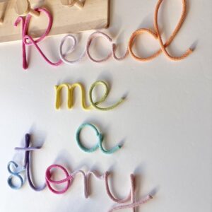 Read me a story pastel rainbow reading corner sign