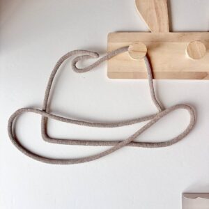 Handmade cowboy hat wall decor in western style displayed on rustic interior wall