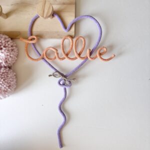 Personalized heart nursery sign handmade for baby room and playroom styling.