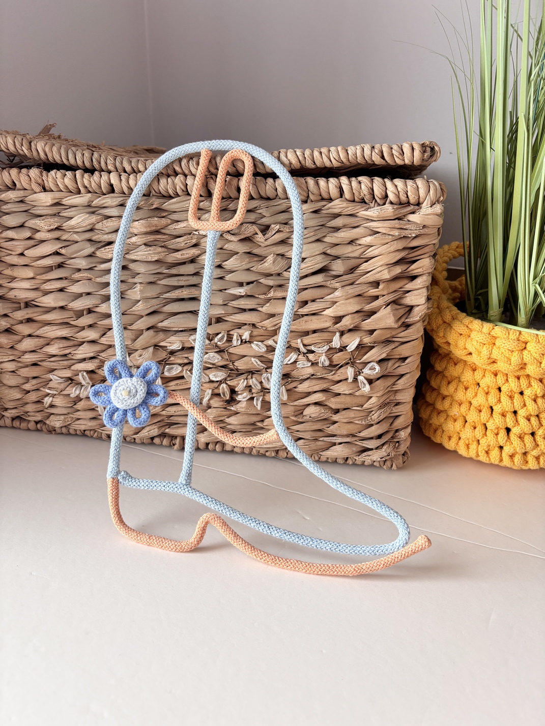 Cute cowgirl boot wall art displayed in a pastel Western themed nursery for girls.