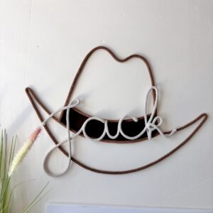 Personalized cowboy hat wall hanging with custom name, handmade western wall decor for a child’s bedroom