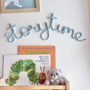 Handmade storytime wall sign for a children’s reading corner, nursery or bedroom