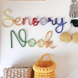 Sensory Nook rainbow wall sign for a colourful children's sensory room
