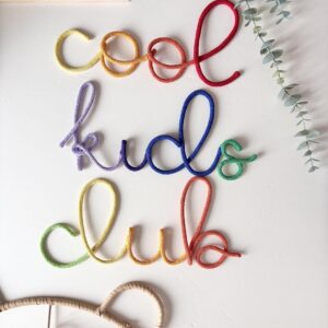 Multicoloured rainbow Cool Kids Club wall sign for a children's bedroom or playroom, with each word measuring approximately 31 cm.